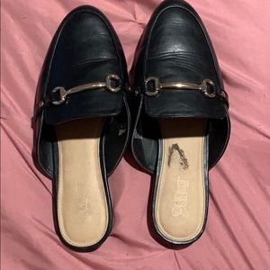 Black slip on loafers.